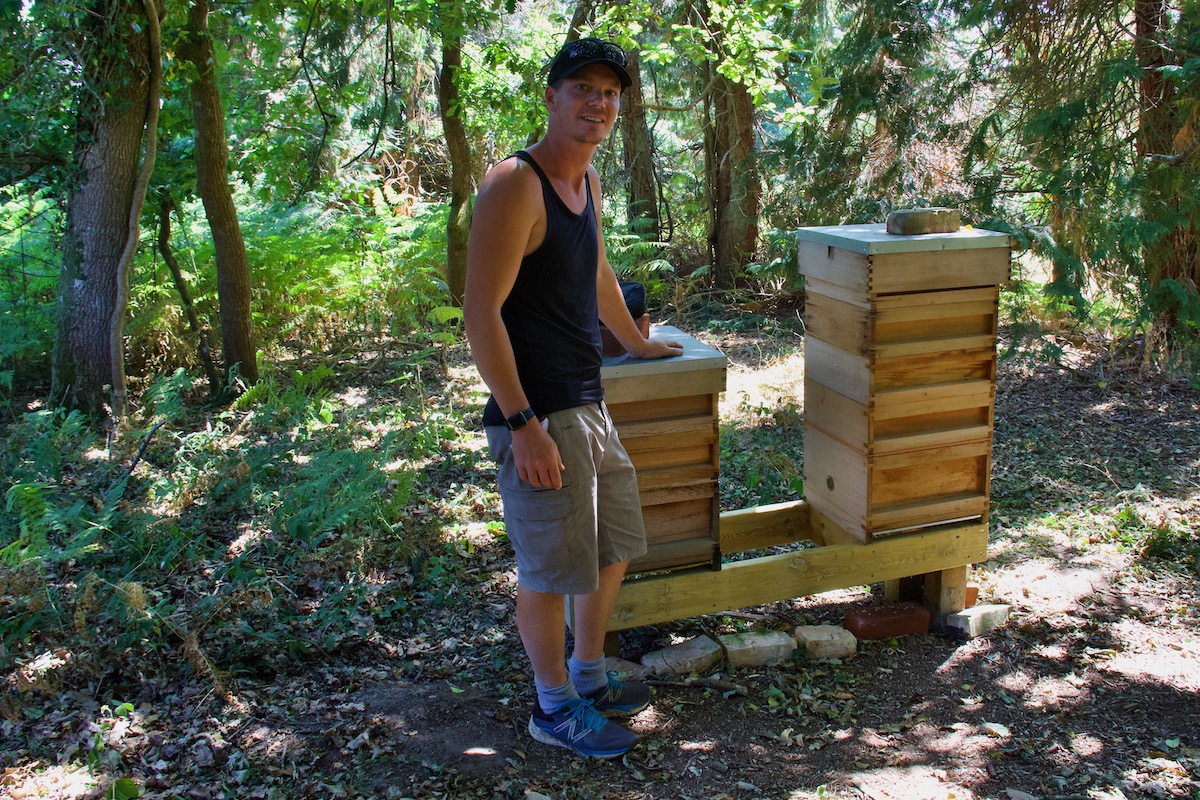 Mike with the Bee Hives in Carey's Secret Garden near Wareham in Dorset