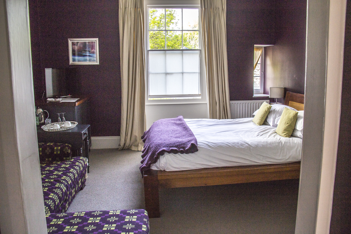A bedroom at Llys Meddyg in Newport, Pembrokeshire, Wales   8493