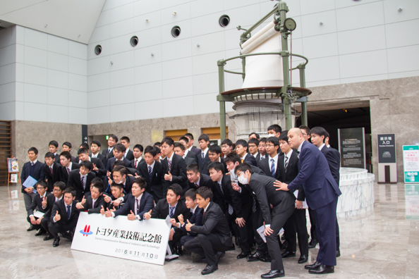 A party of Japanese visitors to Toyota Commemorative Museum of Industry and Technology in Nagoya, Japan