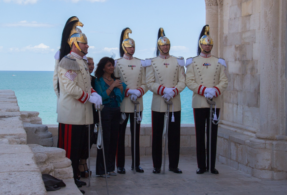 A very elegant wedding party outside the cathedral of Trani in Puglia