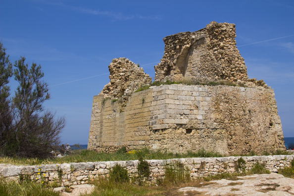 An abandoned defensive tower on the coastlinei near Monopoli in Puglia, Italy