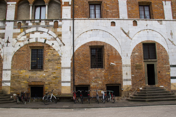 Bricked in arches where the money lenders used to ply their trade in Lucca, Tuscany in Italy