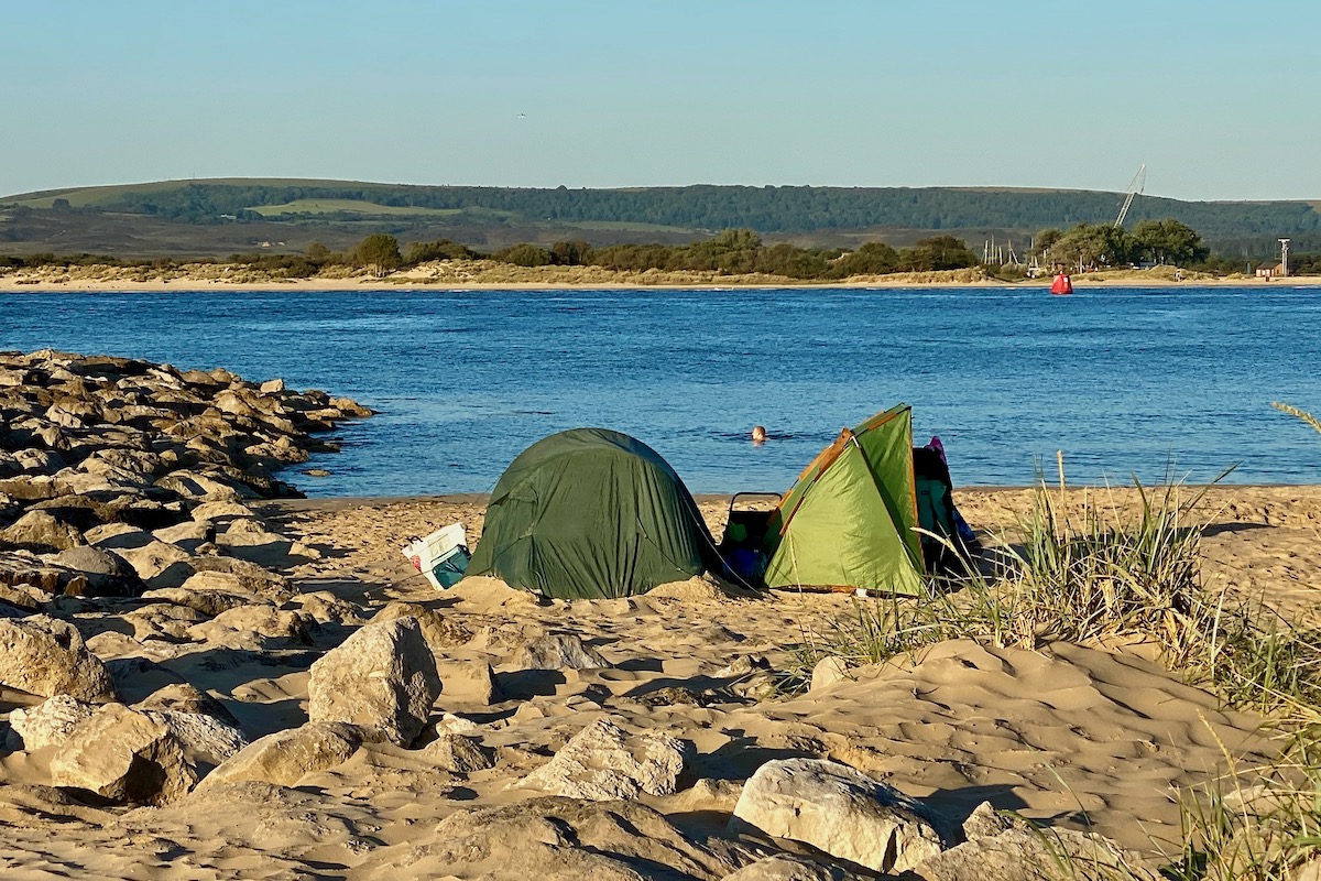Campers on Sandbanks Beach, Dorset