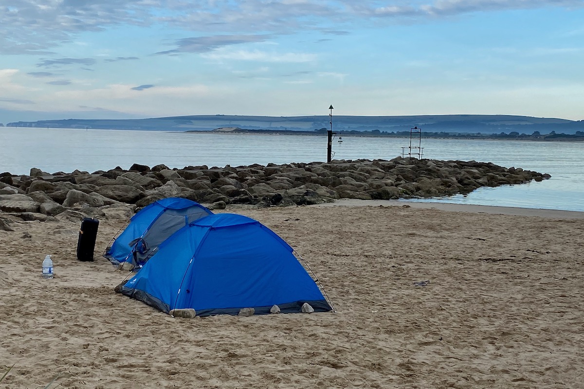 Campers on Sandbanks Beach in Dorset