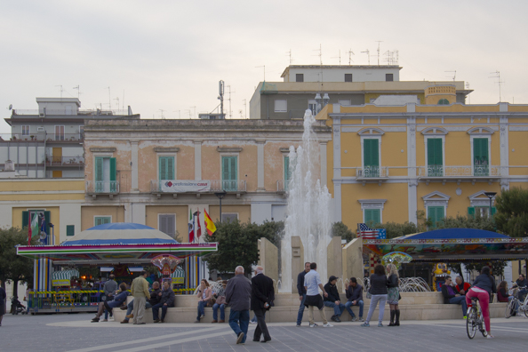 Crowds gather in Piazza Vittorio Emanuele Monopoli in Puglia, Italy