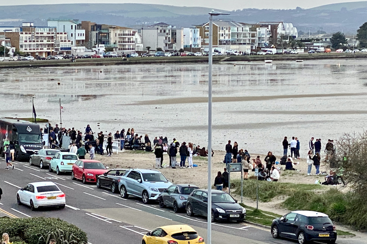 Crowds Gathering on Kite Beach by Poole Harbour in Dorset