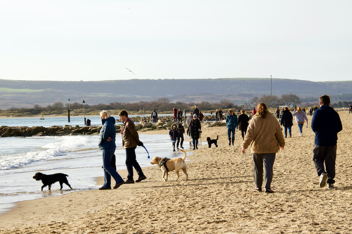 Crowds on Sandbanks Beach in Dorset