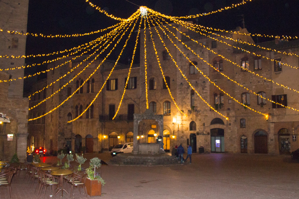 Evening in Piazza della Cisterna in San Gimignano, Tuscany, Italy