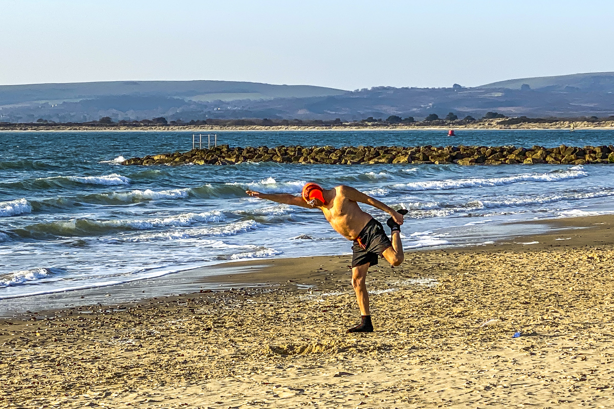 Exercising on Sandbanks Beach in Dorset  4761