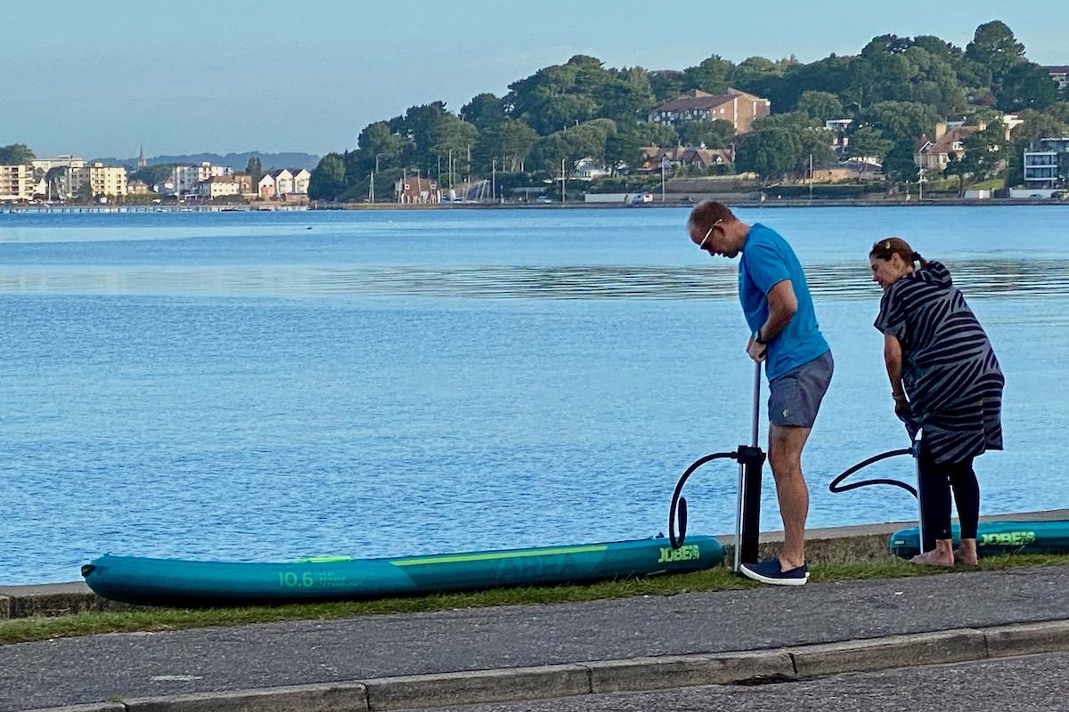 Inflating Paddleboards by Poole Harbour in Dorset