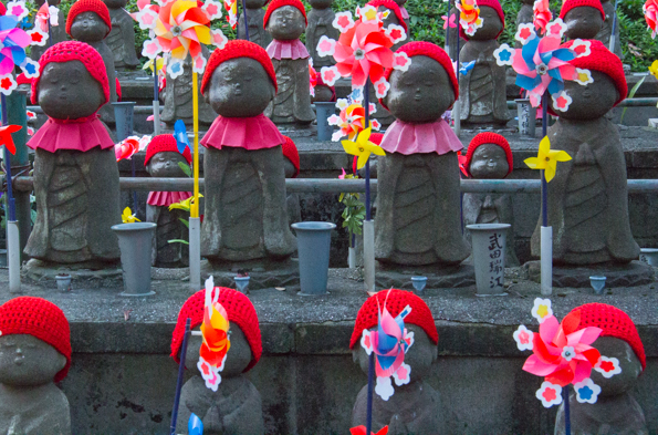 Jizo-Statues at Zojoji-Temple cemetery in Minato, a suburb of Tokyo in Japan