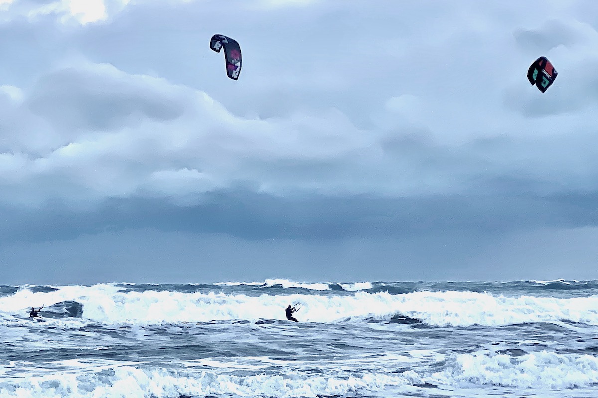 Kite Boarders Battle Wind and Waves off Sandbanks Beach, Dorset