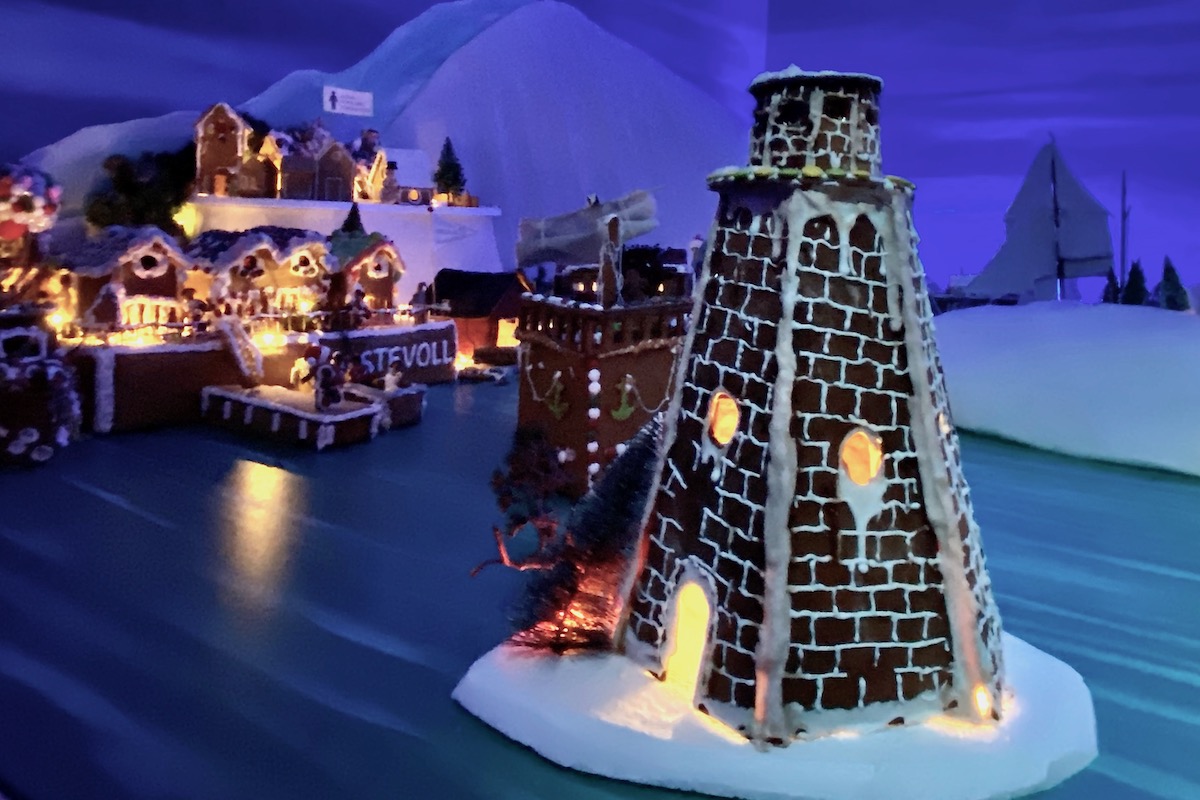 Lighthouse and Ship at the Gingerbread Town, Pepperkakebyen, in Bergen, Norway