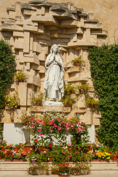 Madonna di Lourdes behind the Church of Madonna di Lourdes in Verona, Italy