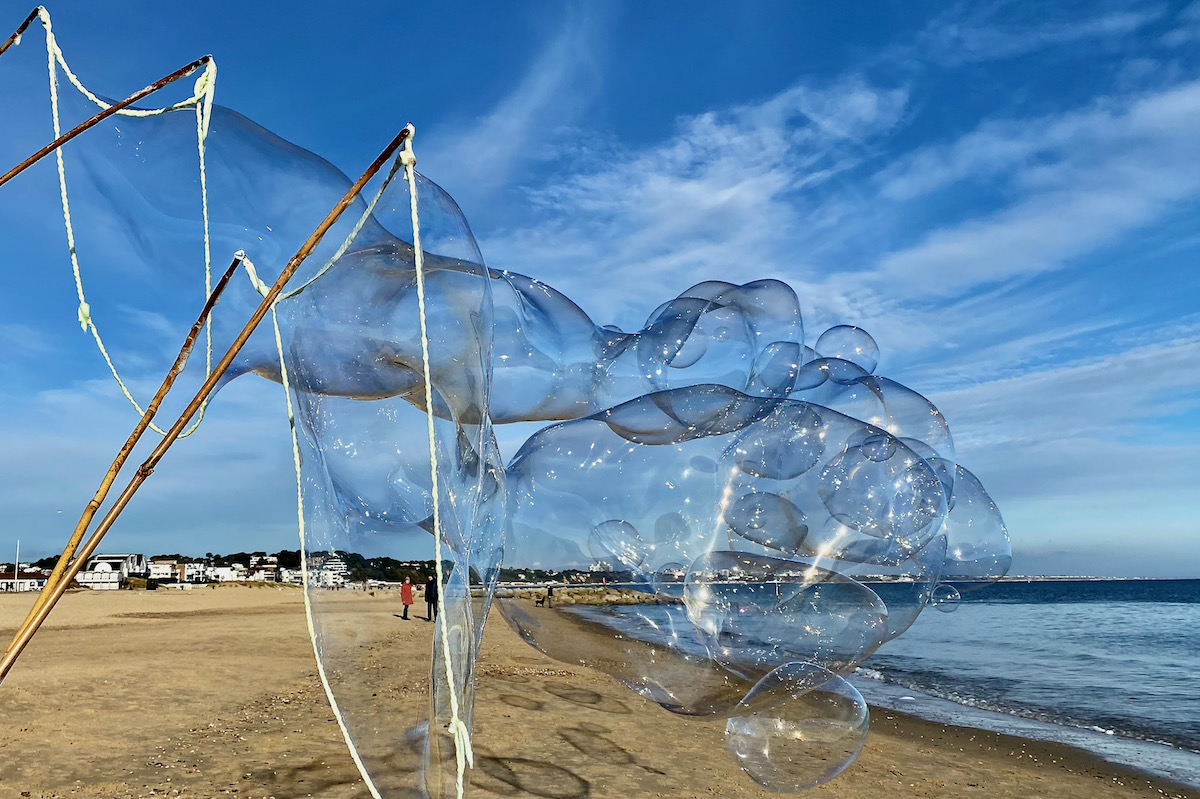 Making Bubbles on Sandbanks Beach in Dorset