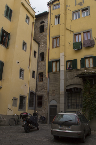 Medieval tower incorporated into the houses in Piazza Donati in Florence, Tuscany, Italy