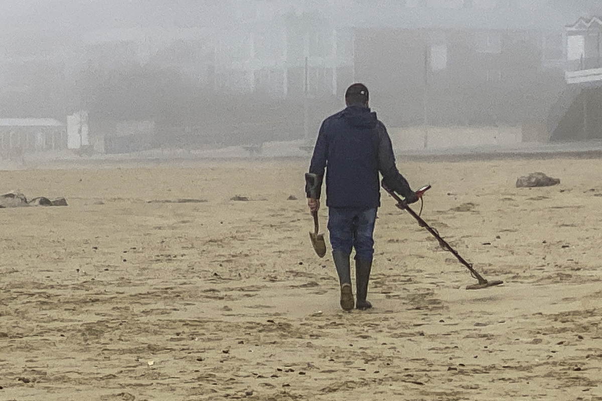 Metal Detector Man on Sandbanks Beach in Dorset  5352