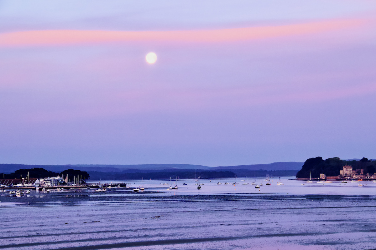 Moon in a Dawn Sky over Poole Harbour in Dorset
