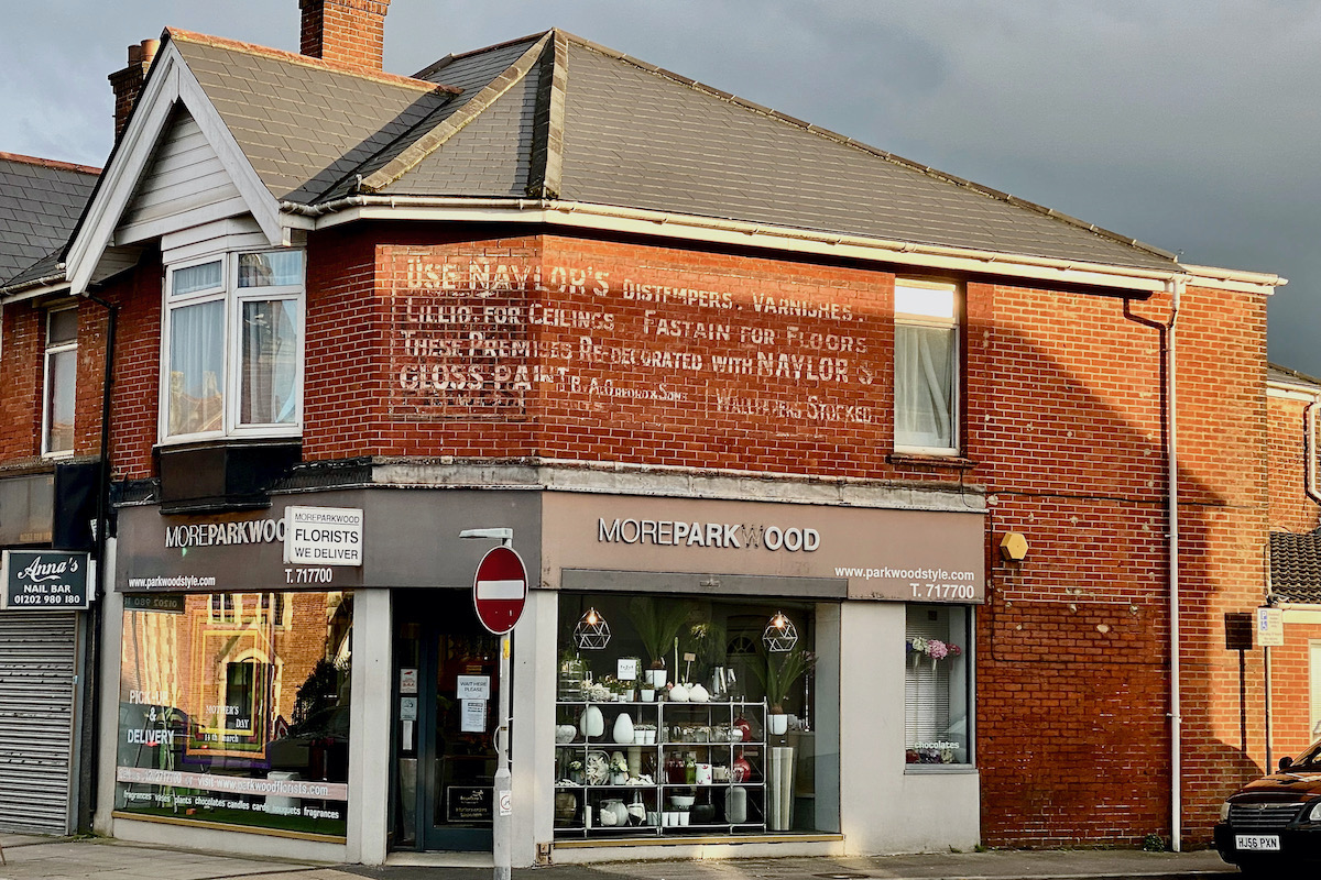 Old Shop Sign in Parkstone, Dorset