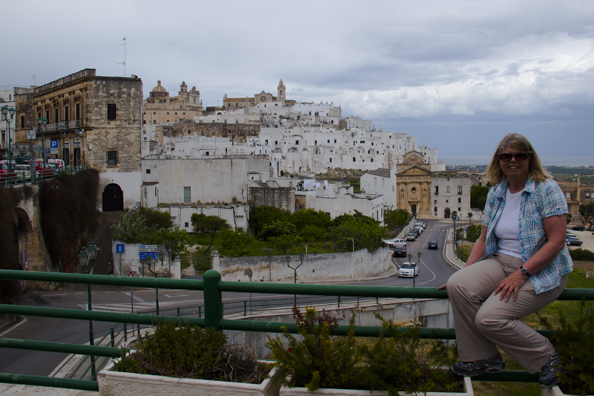 Posing in front of the old town of Ostuni, Puglia, Italy