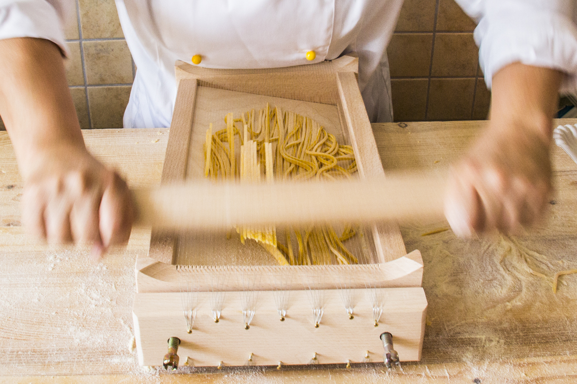 Preparing chitarrina teramana pasta in Giulianova in Abruzzo, Italy  9485