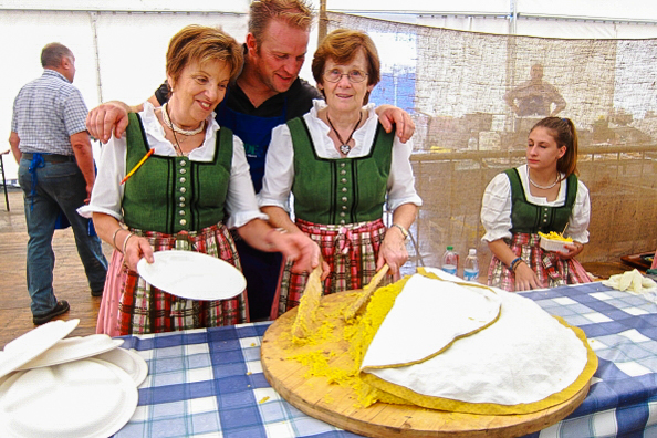 Serving polenta the traditional way in Trentino, Italy