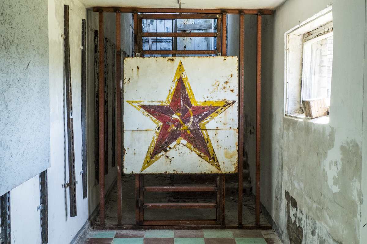Soviet Star at the Old Soviet Radio Station in Latvia   8280672