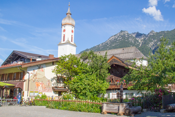 St Martin's Church and a typical painted building in   Garmisch-Partenkirchen in Bavaria