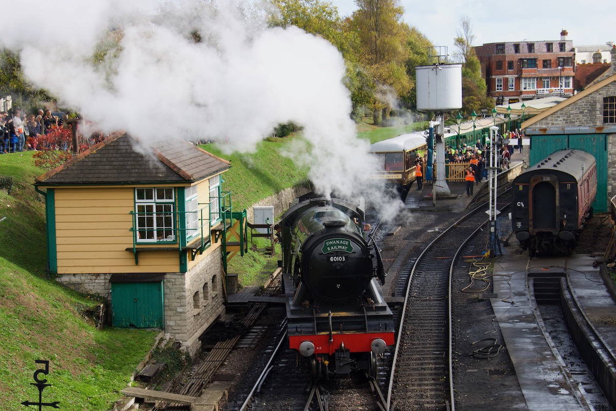 The Flying Scotsman reversing to couple up with seven carriages at Swanage railway station