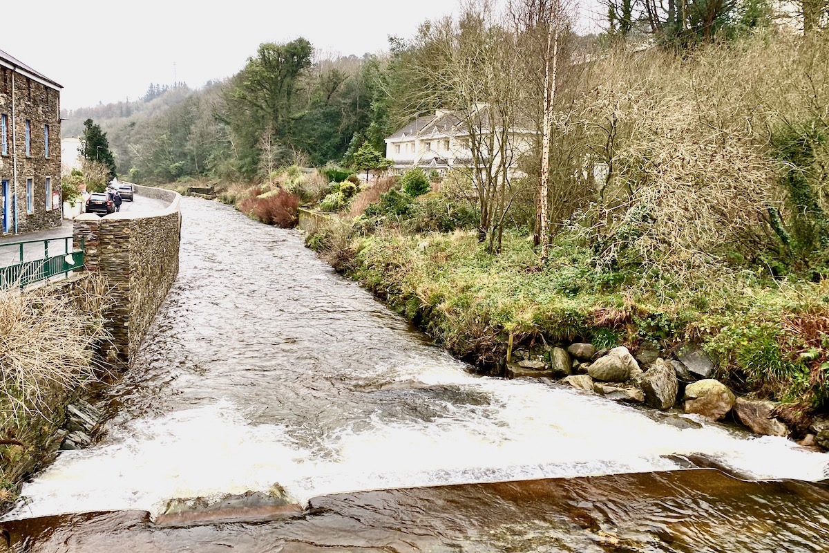 Walking by Laxey River in Laxey on the Isle of Man