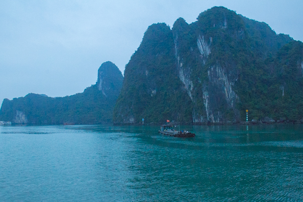 Working boat in Ha Long Bay, Vietnam
